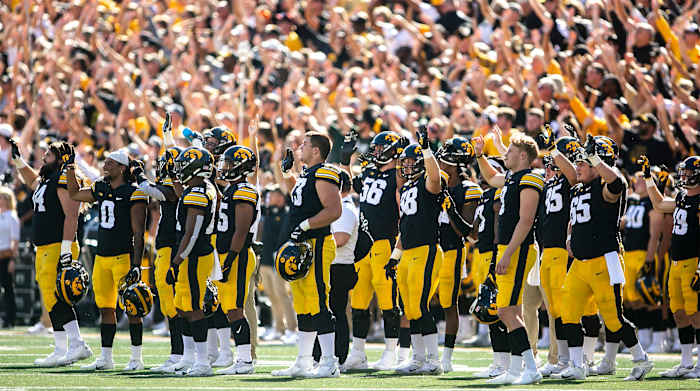 Iowa Hawkeyes players wave to patients in the Stead Family Children's Hospital during a NCAA non-conference football game against Colorado State, Saturday, Sept. 25, 2021, at Kinnick Stadium in Iowa City, Iowa.